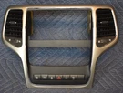 2011-2013 Grand Cherokee Center Dash Bezel Traction/hazards/tow/heat/park Oem. Fixed Price $69.95.